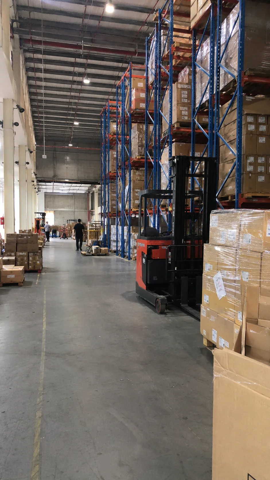 Warehouse forklift and pallets